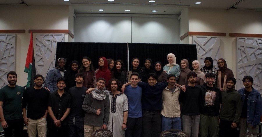 Students of PCO, UMR, ASO, and MSA gathered beside the Palestinian flag at the United for Gaza potluck